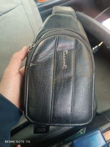 найден кошелек: Продается кошелек барсетка в отличном состоянии . по всем вопросам — 6