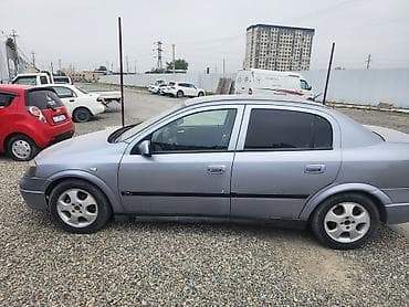 toyota echo: Opel Astra: 2004 г., Седан — 2