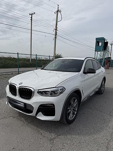 x 7: BMW X4 — интерьер и оснащение - Спортивный кожаный руль M с — 1