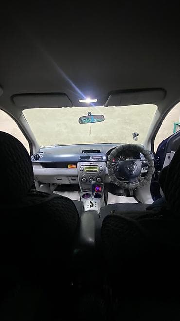 devo matiz: Mazda Demio: 2003 г., 1.5 л, Автомат, Газ, Седан — 4