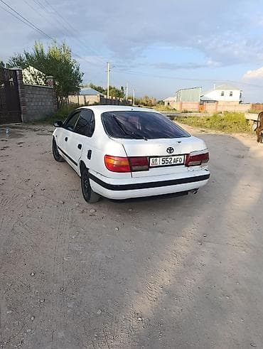 болон 12: Toyota Carina E: 1997 г., 1.6 л, Механика, Бензин, Седан — 4
