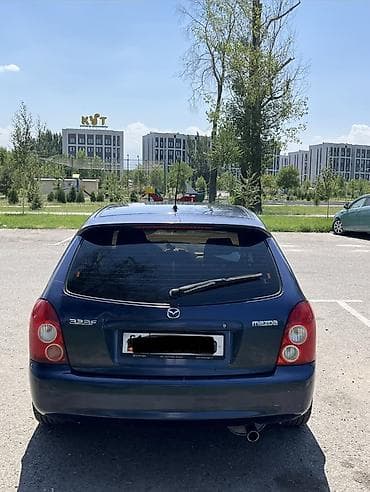 мазда: Mazda 323: 2003 г., 1.6 л, Механика, Газ, Универсал — 2