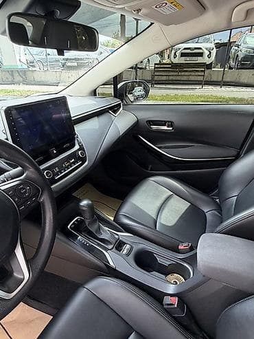 карол: Toyota Corolla: 2019 г., 1.8 л, Вариатор, Гибрид, Седан — 9