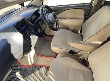 подлокотники: Toyota Raum: 2003 г. — 4