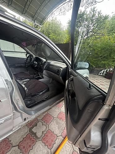 пасат бы 3: Mazda Familia: 2002 г., 1.3 л, Бензин, Универсал — 6