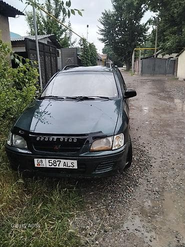 Mitsubishi Space Star: 1998 г., 1.3 л, Механика, Бензин, Хэтчбэк
