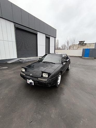 mersedes e211: Mazda 323: 1991 г., 1.8 л, Механика, Бензин, Хэтчбэк — 1