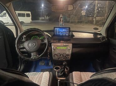 шины на эксковатор: Mazda 2: 2008 г., 1.4 л, Робот, Бензиновая, Хэтчбэк — 6