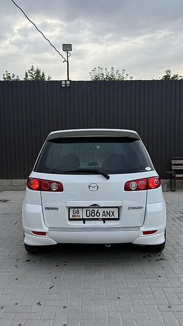 mazda 323 универсал: Mazda Demio: 2003 г., 1.3 л, Автомат, Бензин, Хэтчбэк — 6