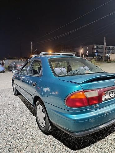 1998: Mazda 323: 1998 г. — 4