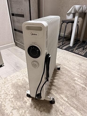 вентилятор охлаждения радиатора: Масляный обогреватель Кол-во секций: 10 и более — 1