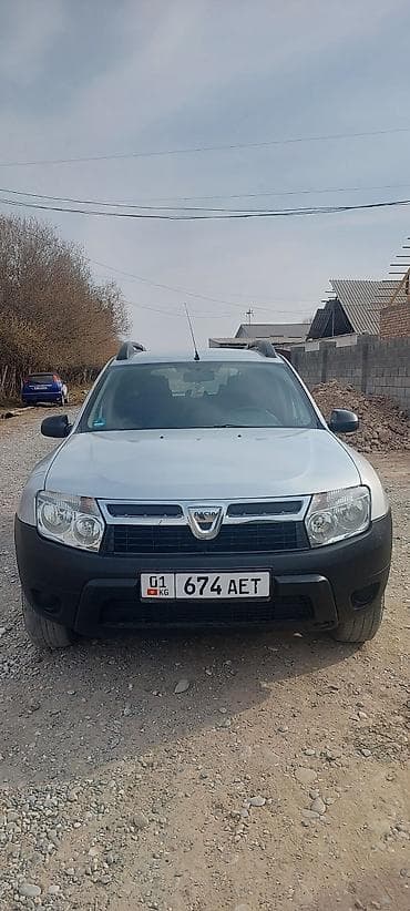 Dacia: Dacia Duster: 2012 г., 1.6 л, Механика, Бензин, Кроссовер — 1