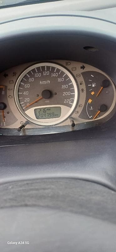 Nissan Almera Tino: 2001 г., 1.8 л, Механика, Бензин, Хэтчбэк — 5