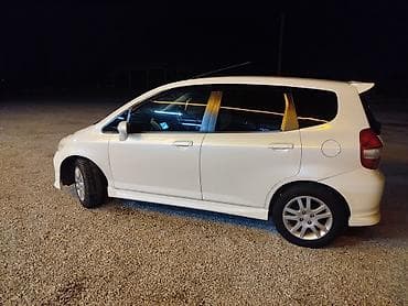 Транспорт: Honda Fit: 2002 г., 1.3 л, Вариатор, Бензин, Седан — 2