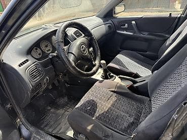 радиатор на опель вектра б: Mazda Familia: 2001 г., 1.6 л, Механика, Бензин, Универсал — 1