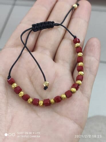 красная нить с золотом 585: Очень красивый Браслет с камушками Гранат Серебро под желтого золото — 1