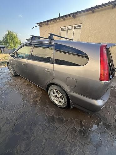 сгу в машине: Honda Stream: 2003 г., 2 л, Газ, Минивэн — 4