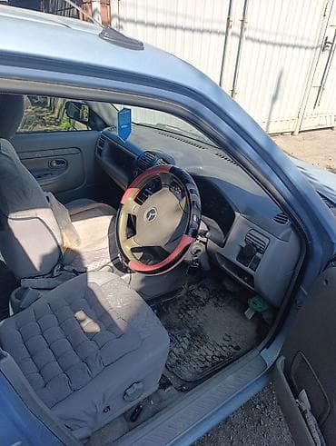 пороги мазда: Mazda Demio: 2001 г., Автомат, Бензин, Хэтчбэк — 5