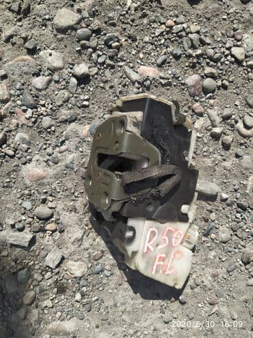 реставрация бронированных дверей: Nissan Pathfinder R50 Замок дверной центральный, Ниссан Патфаиндер — 1