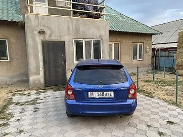 5: Mazda 323: 2003 г., 1.3 л, Механика, Бензин, Хэтчбэк — 4