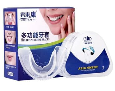 резиновый дилдо: Зубные ортодонтические брекеты для выравнивания зубов. Материал — 1