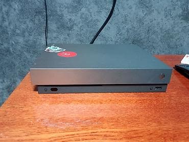 автомагнитола с двд: Игровая консоль Xbox One X (1 ТБ) с двумя беспроводными геймпадами — 5