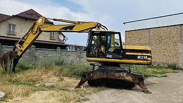 ef m: Экскаватор, Caterpillar, Колесный — 5