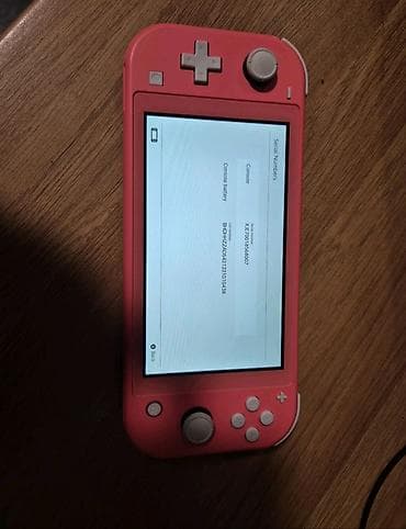 nintendo 2: Nintendo Switch Lite (коралловый) - Портативная консоль для игр — 1