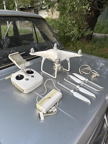 задаю: Квадрокоптер DJI Phantom (серия Phantom 3/4 — белый корпус с опорами — 2