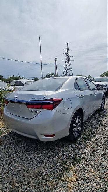 Toyota Corolla: 2019 г., 1.8 л, Робот, Гибрид, Седан — 4