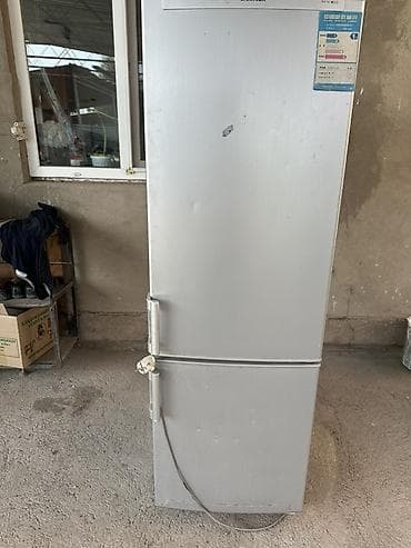 тв сони: Холодильник двухкамерный, серебристый, с нижней морозильной камерой — 2