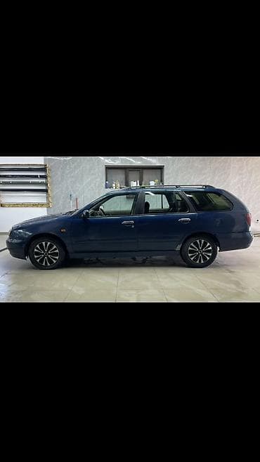 один владелиц: Nissan Primera: 1999 г., 2 л, Автомат, Бензин, Седан — 8