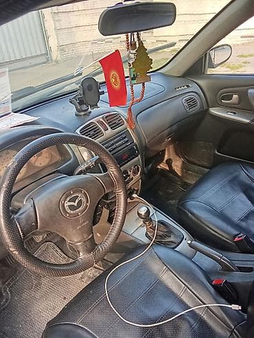 мазда фамилия: Mazda Familia: 2000 г., Ручные, Бензин, Универсал — 10