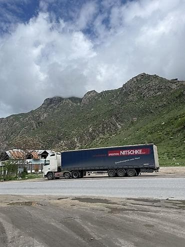 ауман тягач: Грузовик, Volvo — 2
