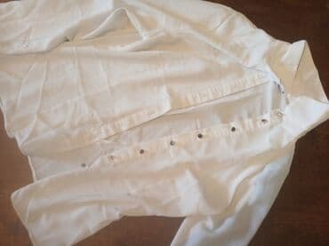 срочно продаю в связи с переездом: Продаю б/у женскую одежду 46 размера рубашки, пиджаки, юбки,платья — 5