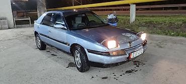 степ 1996: Mazda 323: 1994 г., 1.6 л, Механика, Бензин, Хэтчбэк — 2