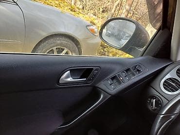 Volkswagen Tiguan: 2015 г., 1.3 л, Механика, Бензин, Кроссовер