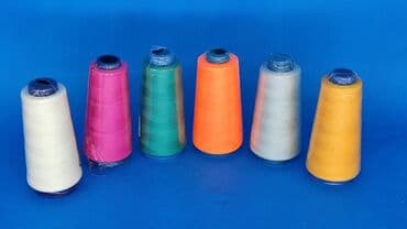 купить швейную машинку для шитья кожи: ХБ нити фирмы Идеал. Нитки для пошива одежды. Разная палитра цветов — 2