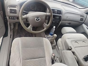 Mazda 626: 2000 г., 1.8 л, Механика, Бензин, Хэтчбэк — 4