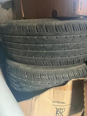 тачка балон: Пара автомобильных шин R15 Характеристики: - Размер: 195/65 R15 - — 2