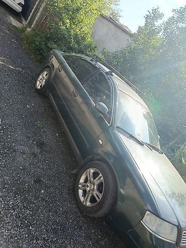 Audi A6: 1999 г., Седан