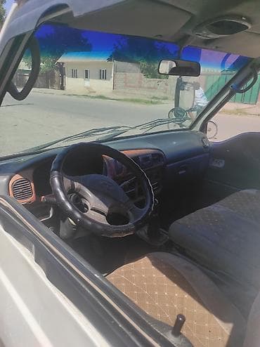дордой мото: Грузовой малотоннажный бортовой автомобиль (кабина над мотором), белый — 4
