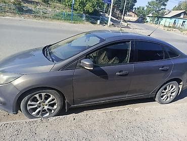 Ford Focus: 2012 г., 1.6 л, Механика, Бензин, Седан