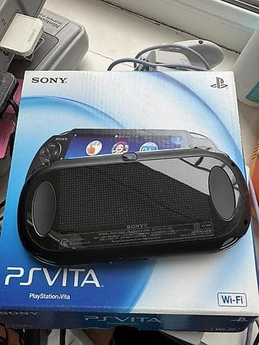 нужна: Sony PlayStation Vita Fat, полный комплект, коробка, бумаги, кабеля — 2