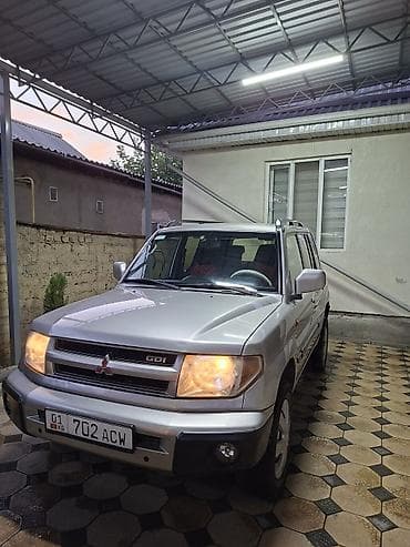 горный: Mitsubishi Pajero iO: 2001 г., 2 л, Автомат, Бензин, Внедорожник — 2