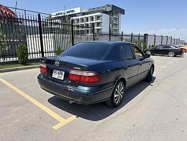 aida: Mazda 626: 1999 г., 1.8 л, Бензин, Седан — 4