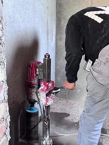 Алмазное бурение отверстий в бетоне, кирпиче и камне - Вертикальное и