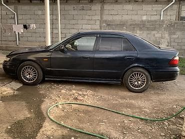 кирг шёлк: Mazda 626: 1998 г., 1.8 л, Кол менен иштөөчү, Бензин, Седан — 3