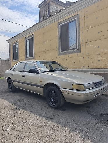 Унаа: Mazda 626: 1989 г., 2 л, Кол менен иштөөчү, Бензин, Лифтбек — 2