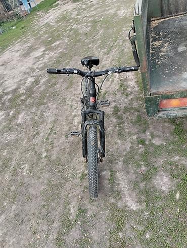 Горный велосипед с жёсткой вилкой и 26" колесами. Особенности: -